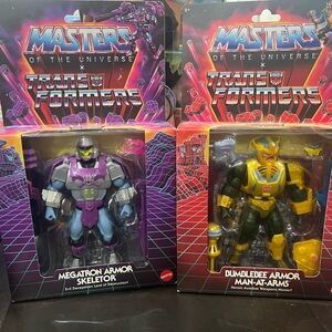 Mattel Masters of the Universe Transformers Megatron and Bumblebee Figures